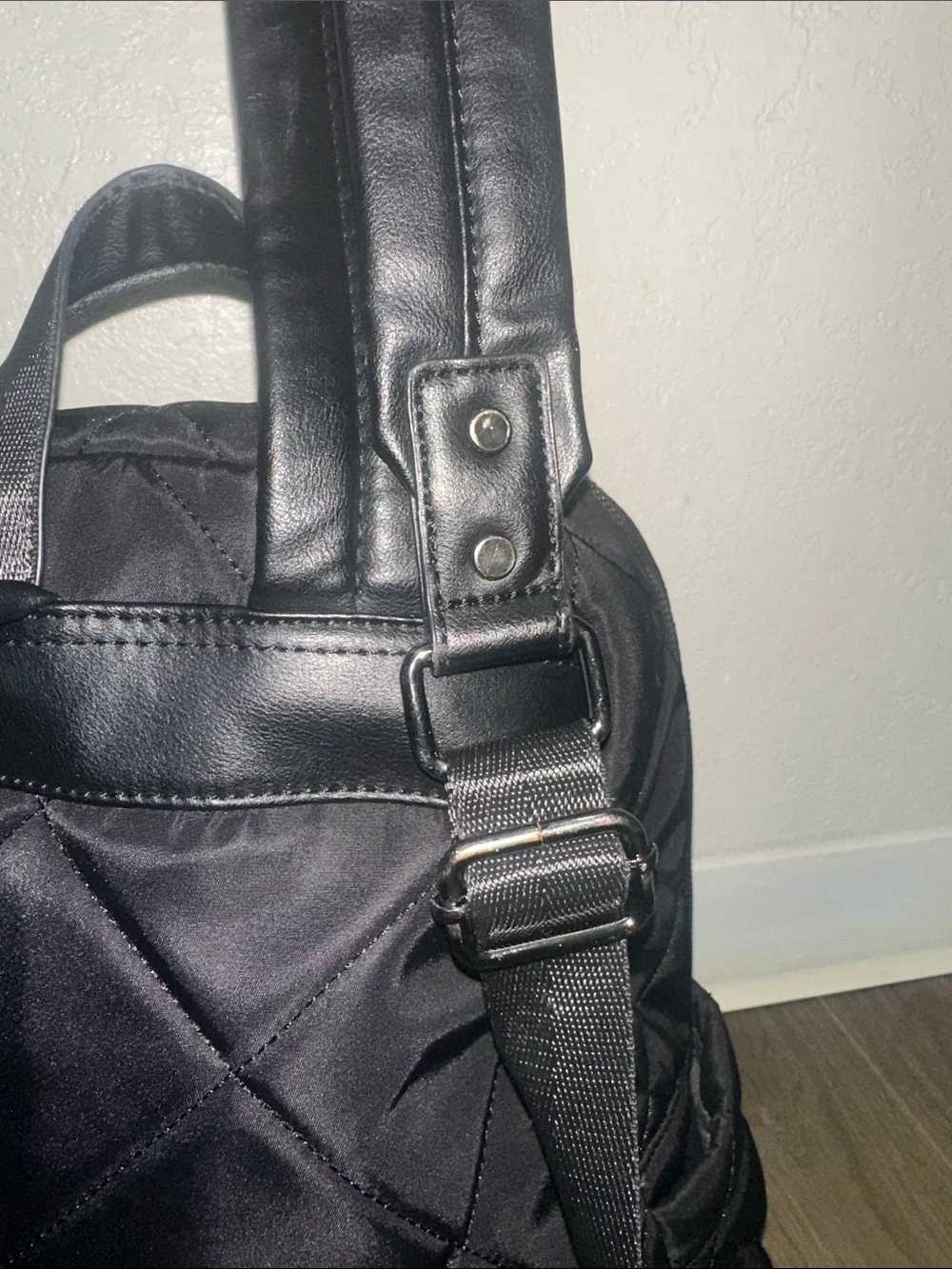 Peloton Black Quilted Men's Backpack with Front Zip Pocket